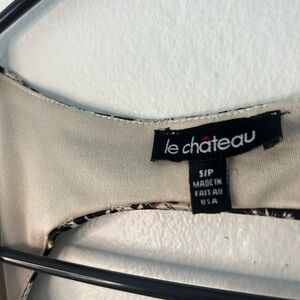 Le chateau beautiful sexy animal print dress. Open back. stretchy